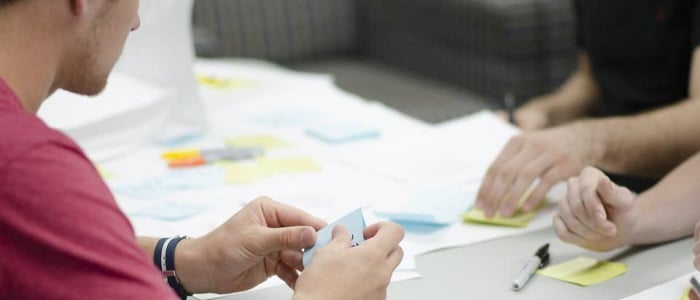 a man presenting his content marketing plan to his employer